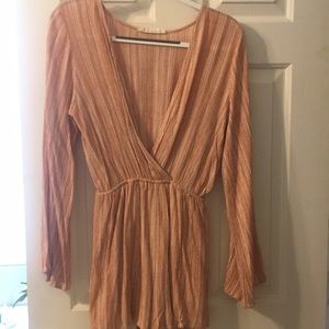 Audrey styled long-sleeve orange romper